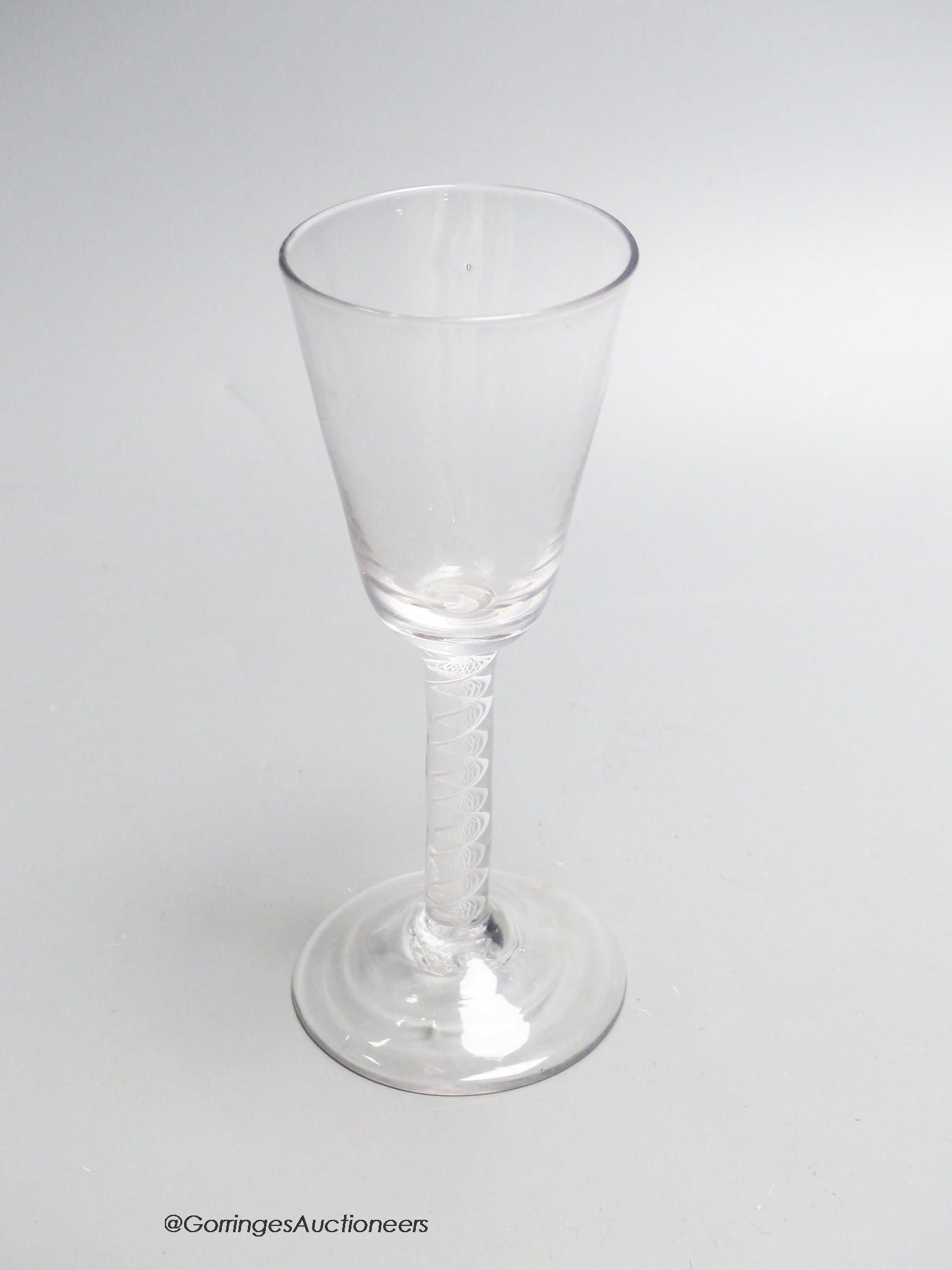 A Georgian opaque twist stem ale glass, c.1765, height 15cm
